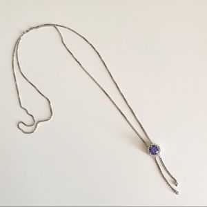 Silver necklace with blue stone